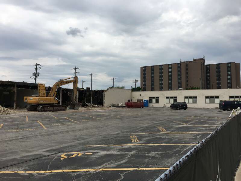 Demolition of a warehouse and office building adjacent to Camera Corner in downtown Green Bay, WI. Camera Corner is set to expand to this area.