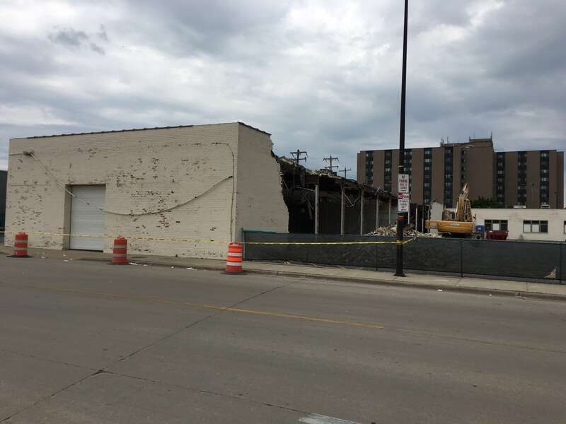 Demolition of a warehouse and office building adjacent to Camera Corner in downtown Green Bay, WI. Camera Corner is set to expand to this area.