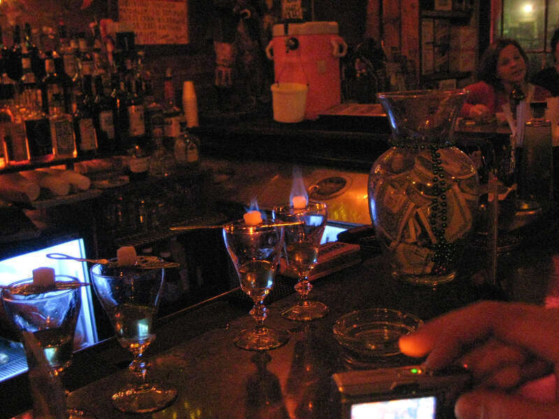 Preparing absinthe in a bar off Pirate's Alley, French  Quarter, New Orleans.
