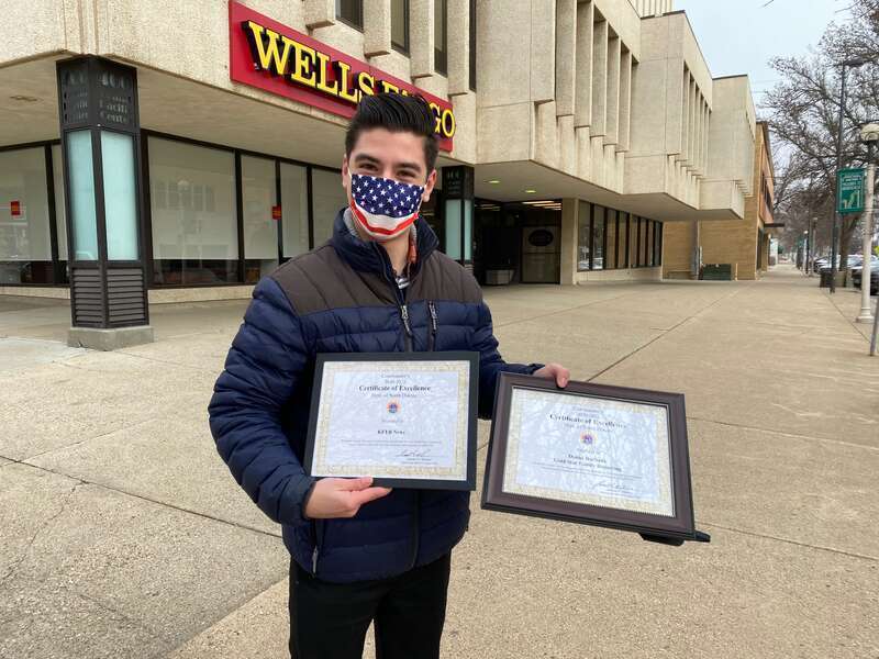 Daniel Burbank received an award from the North Dakota AMVETS for his reporting on Gold Star Families who lost loved ones in the Vietnam War.