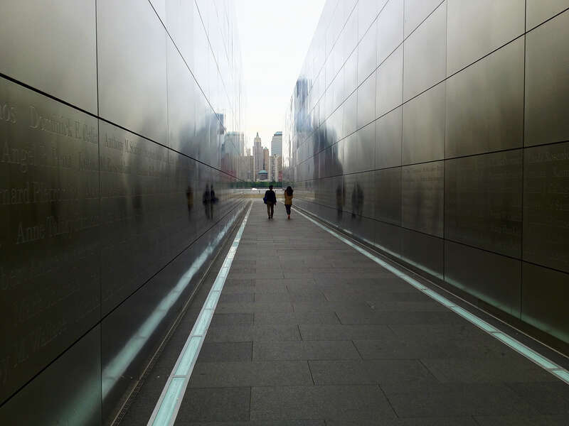 September 11 memorial at Liberty State park in Jersey City, NJ. There is a slight reflection of the freedom tower on the right wall. The name of the memorial is &quot;Empty Sky.&quot; There are a total of 756 names on the walls. Listed are New Jersey residents