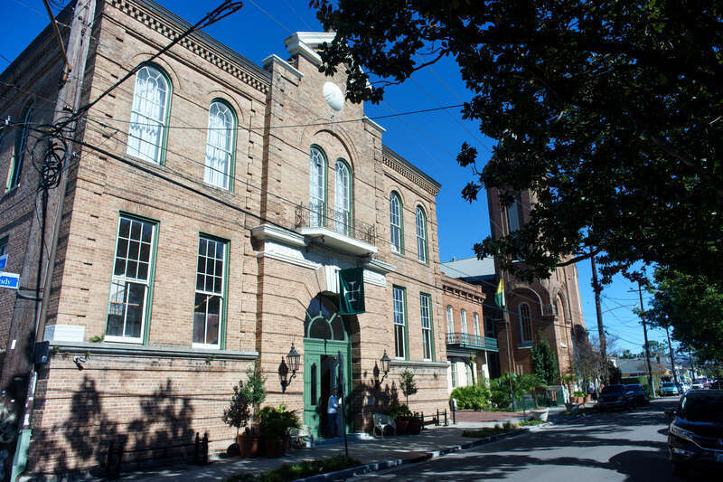 Front of Hotel Peter and Paul primarily showing the front of the schoolhouse building.