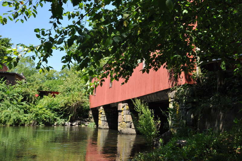 This covered bridge was built on 18th-century stone piers, on the grounds of the Eli Whitney Gun Factory in Hamden, Connecticut.