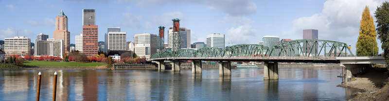 The Hawthorne Bridge in Portland, seen from the southeast side of the bridge.  This is a 7x1 panoramic stich.