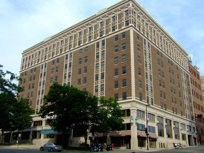 Located at 119-123 W. Washington Avenue (at the intersection with Fairchild Street) in Madison, Wisconsin, the 10-story Hotel Loraine was designed by Herbert W. Tullgren and constructed between 1923 and 1925 for Milwaukee hotel and insurance magnate