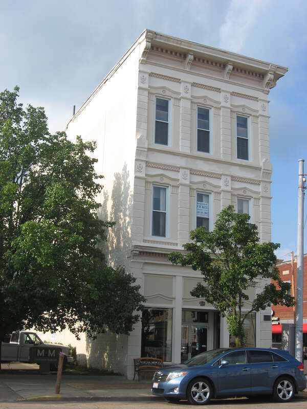 Front and western side of the McCarthy-Blosser-Dillon Building, located at 4 W. Main St. in Logan, Ohio, United States.  Built in 1883, it is listed on the National Register of Historic Places, and it is part of a Register-listed historic district,