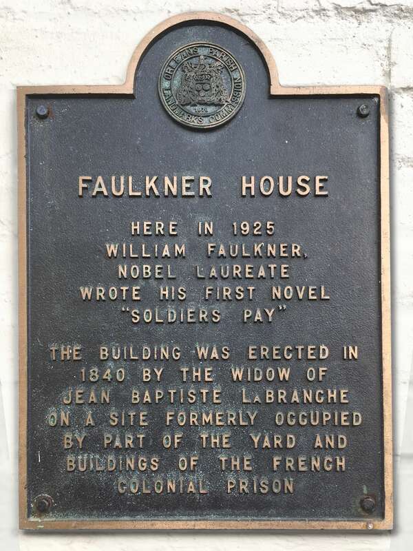 Bronze plaque in Pirate's Alley, New Orleans, Louisiana, commemorating the house where in 1925 American writer William Faulkner wrote his first novel, Soldiers' Pay.