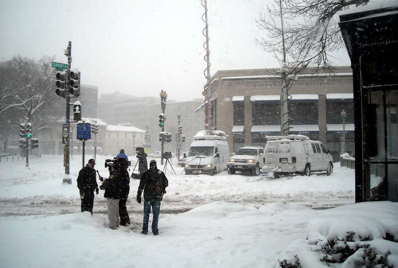 On-the-scene reporting during the Second North American blizzard of 2010. The news crew is standing on the north side of Dupont Circle in Washington, D.C.  The PNC Bank, Dupont Circle branch, is visible in the background.