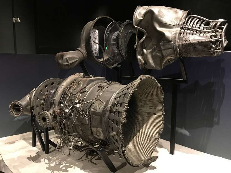 Recovered F-1 engine parts. Gas Generator and Heat Exchanger (top) from engine on Apollo 16 mission and Thrust Chamber (bottom) from #3 engine on Apollo 12.