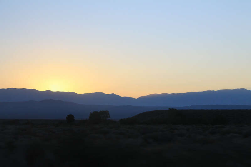 500px provided description: Sunrise Over Purple Mountains [#sunrise ,#blue ,#glow ,#orange ,#purple ,#mountain ,#hill ,#sage ,#plain]