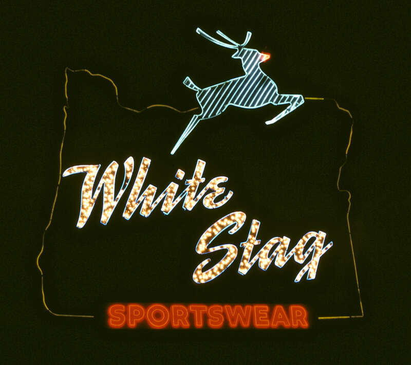 The White Stag Sign, in Portland, Oregon, at night. The sign displayed this wording from 1957 until 1997.  During the Christmas and holiday season, a simulated &quot;red nose&quot; placed over the stag's snout is turned on, in imitation of the character,