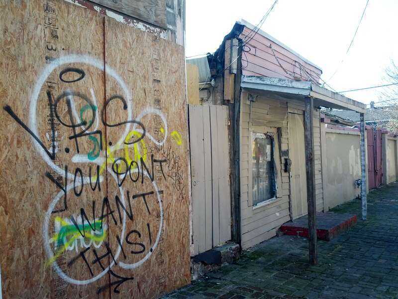 New Orleans January 2015 - Graffiti and decayed building, 2100 block of Burgundy Street, Faubourg Marigny