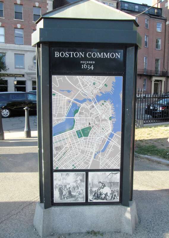 An Boston Common information sign located near the entrance at the corner of Beacon and Charles Streets.