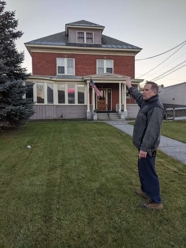 Brian Judd in front of American Legion Post 10 at 320 North Main Street (U.S. Route 302) in downtown Barre, Vermont.
