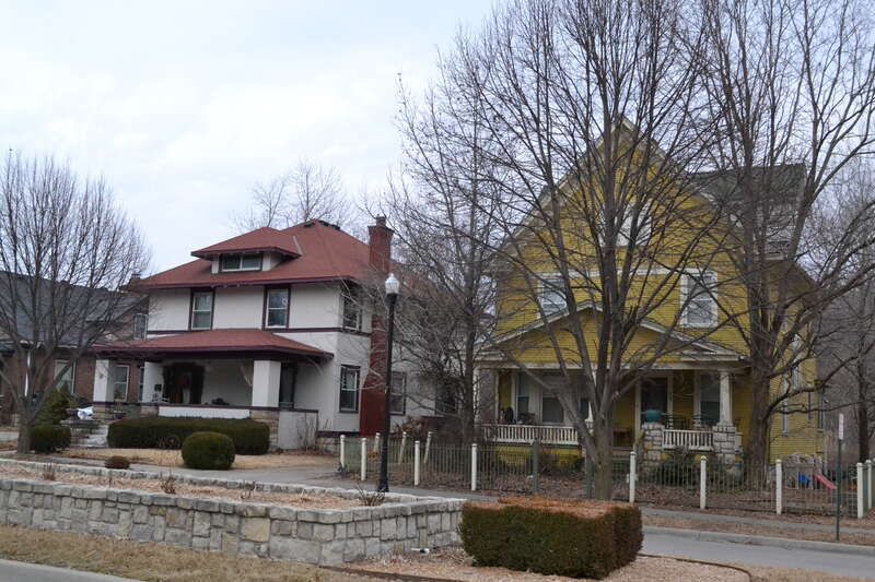 The Holmes residence (left) and the Clark House (right) in Excelsior Springs, Missouri. Both contributing structures to The Elms Historic District