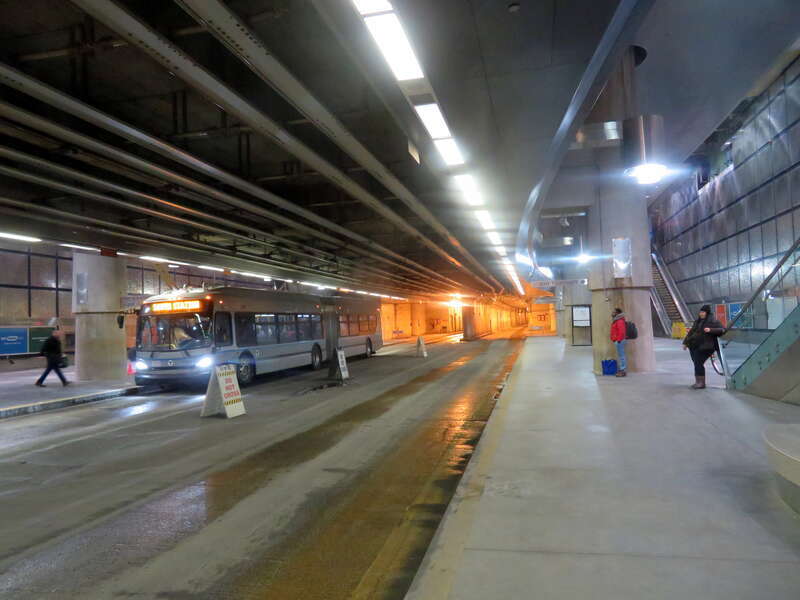 An inbound battery-electric test bus at Courthouse station in December 2019