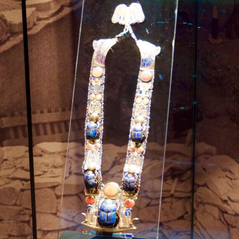 During Howard Carter's excavations which led to the discovery of Tutankhamun's Tomb, a water boy was setting out a container for the workers. Looking closely at the ground, he discovered a hole filled with debris and a step down, carved into the