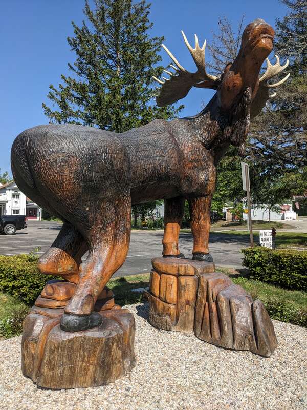 Carved wooden moose sculpture on lawn of Eastern Slope Inn Resort at 2760 White Mountain Highway (U.S. Route 302) in North Conway, New Hampshire.