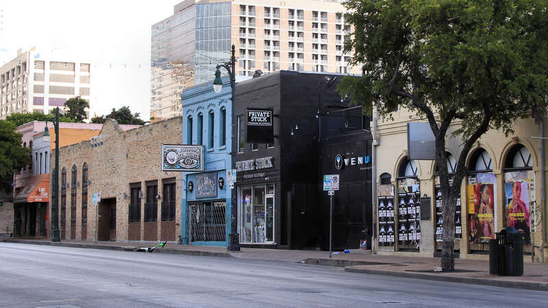 The north side of the 500 block of East 6th Street in Austin, Texas, United States looking west. This is part of the Sixth Street Historic District which was listed on the National Register of Historic Places on December 30, 1975.
