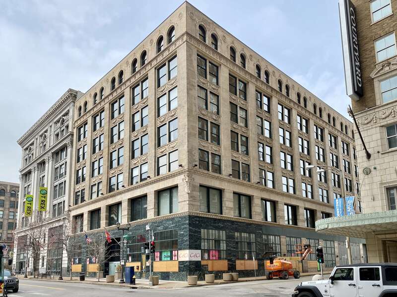 Lammert Building (Eames and Young, 1898) and Bankers Lofts (Shepley, Rutan and Coolidge, 1892) visible in the background.  The buildings are contributing structures in the Washington Avenue East of Tucker Historic District, listed on the National