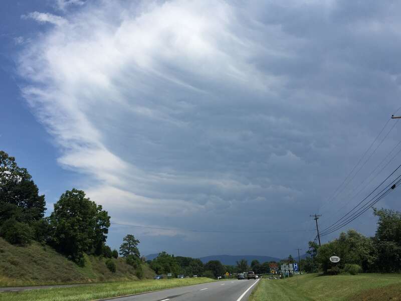 Thunderstorm cirrus anvil with mammatus hanging down above U.S. Route 211 eastbound and U.S. Route 340 northbound (Lee Highway) just west of U.S. Route 211 Business (Main Street) in Luray, Page County, Virginia