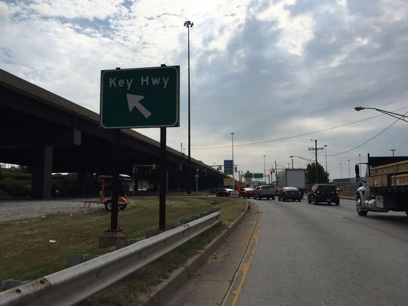 View north along Maryland State Route 2 Truck (McComas Street) where it turns left onto Key Highway adjacent to Interstate 95 in Baltimore City, Maryland