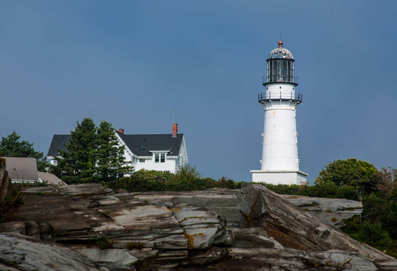 I took this on a foggy Monday morning.  The fog at this time was more dense over the water and had begun to dissipate around the lighthouse.
The area is known as &quot;Two Lights&quot; due to the history of the station. It was originally built in 1828 as two