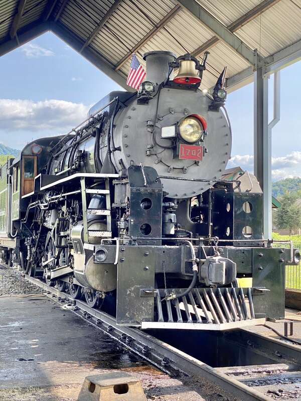 Great Smoky Mountains Railroad 1702 is an S160 class 2-8-0 &quot;Consolidation&quot; type steam locomotive built in September 1942 by the Baldwin Locomotive Works in Philadelphia, Pennsylvania, originally for the U.S. Army Transportation Corps during World War