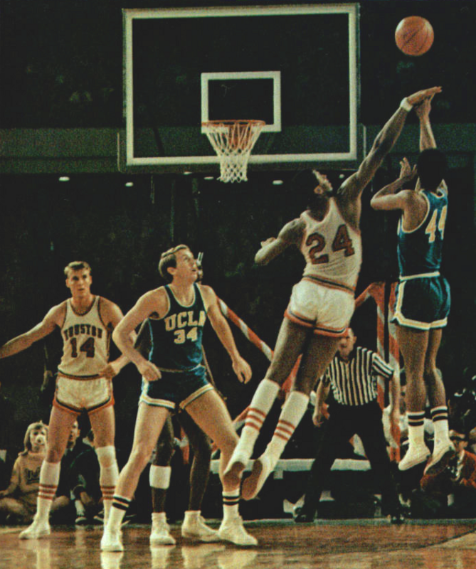 Houston's Don Chaney (#24) attempts to block a shot by UCLA's Michael Warren (#44) at the Astrodome in Houston during the 1968 Game of the Century