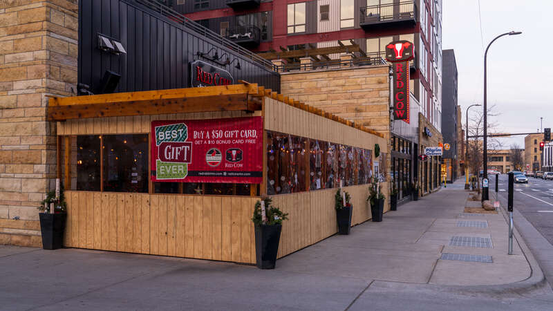 An outdoor dining setup at Red Cow restaurant in the north loop near downtown Minneapolis. Indoor dining shut down due to COVID-19.