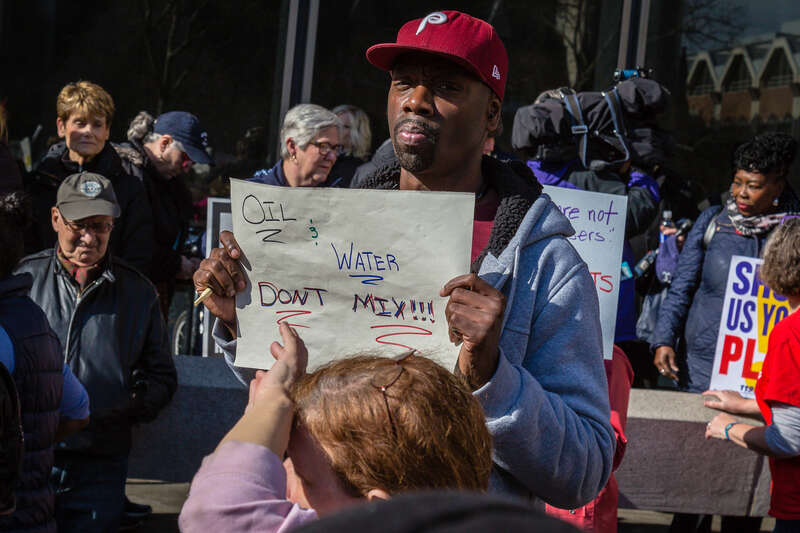 With a focus on health care and the environment, thousands protest on the streets of Philadelphia during a visit by U.S. President Trump to a downtown Republican Party legislative retreat on January 26, 2017.