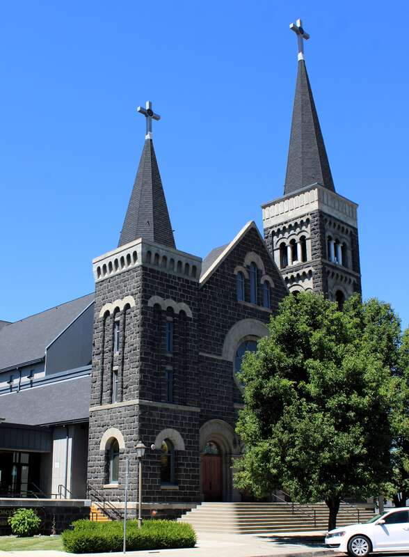 St. Joseph Catholic Church in Yakima, Washington. The church was completed in 1905. It was heavily damaged in a fire in 1999. All that remains of the 1905 church building is the facade and the towers. The rest of the church is new construction