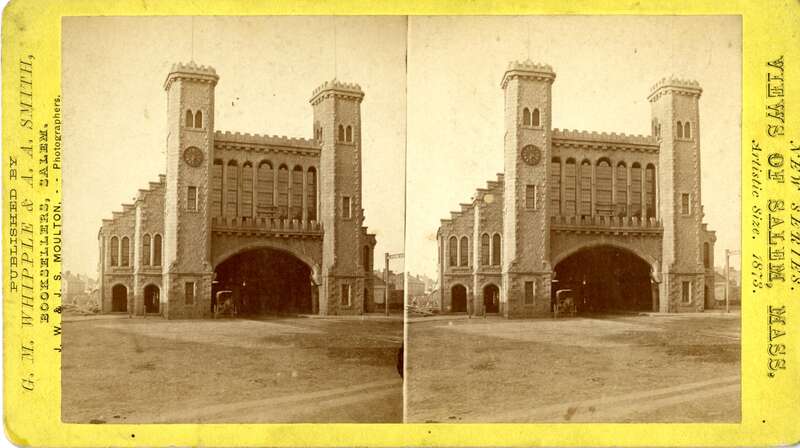 Stereo view of the Eastern Railroad depot in Salem, Massachusetts, at the end of Washington Street. A horse-drawn carriage is visible in the center under the station's granite archway.