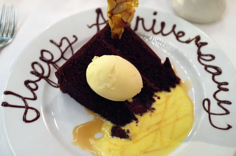 Sweet and Salty cake with crème anglaise and salted caramel sauce.  Jenny had the restaurant add egg nog ice cream.  Happy Anniversary is written around the plate (like last year!)