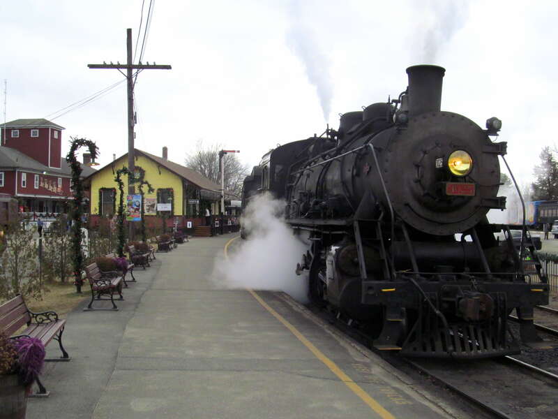 Valley Railroad locomotive 3025 heading an excursion train at Essex station in December 2016