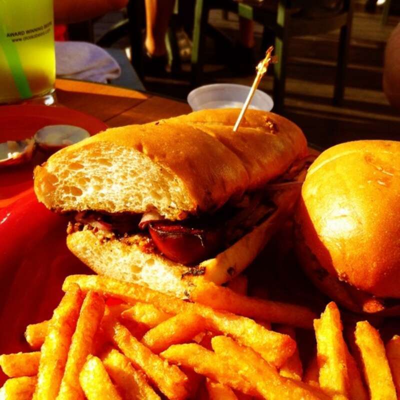 Reindeer sausage and stoneground mustard hoagie in Anchorage, Alaska.