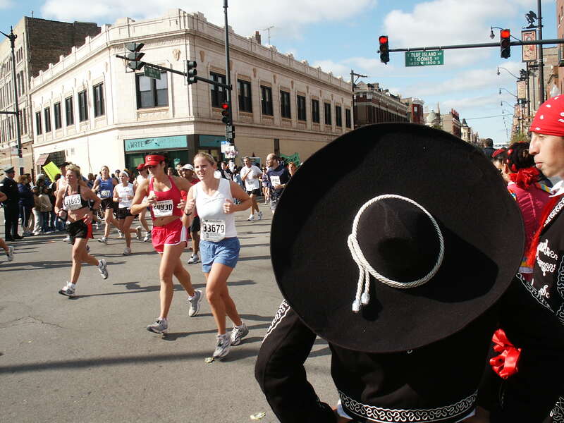 charro watching the runners pass through