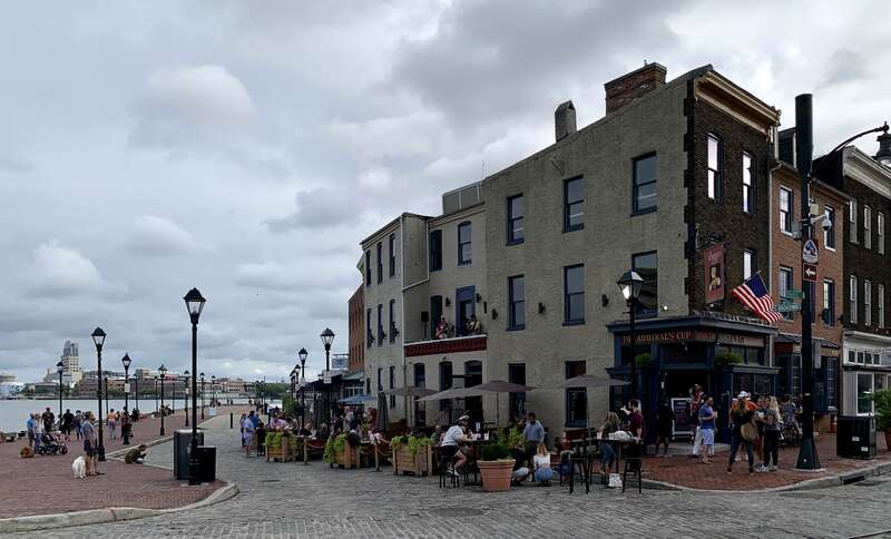 The corner of South Broadway and Thames Streets in Fell's Point, Baltimore, Maryland. Broadway Pier is in the background.