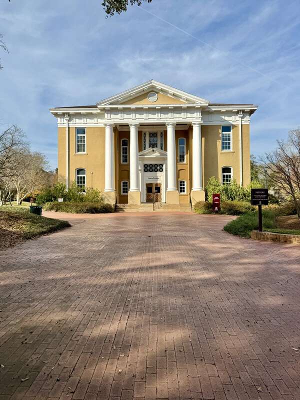 Built in 1909, this Classical Revival-style building was designed by Charles C. Wilson to house the Department of English at the University of South Carolina, and was the first new building to be built after the Civil War.  The building was named for
