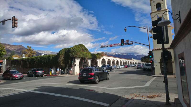 Downtown Ojai looking at the &quot;arcade&quot; and showing snow on the Topatopa mountains.