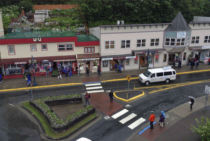 Fil-AM Mart and other older stores on Franklin St, by Roundabout, Juneau, Alaska.