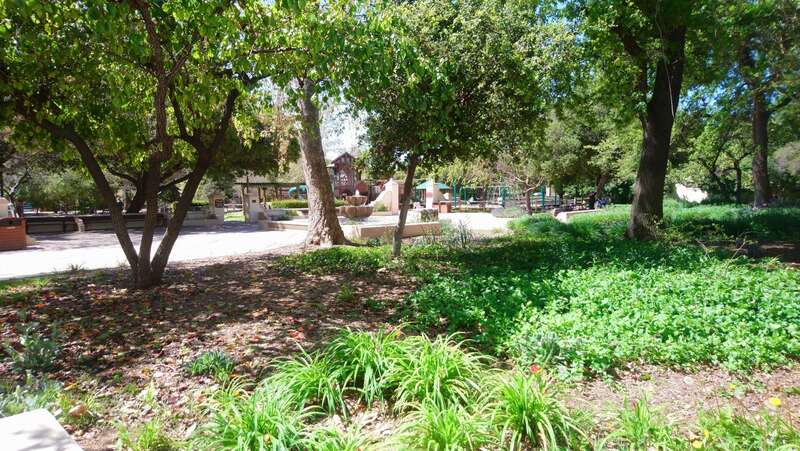 The front of Libbey park -- showing the fountain and children's playground.