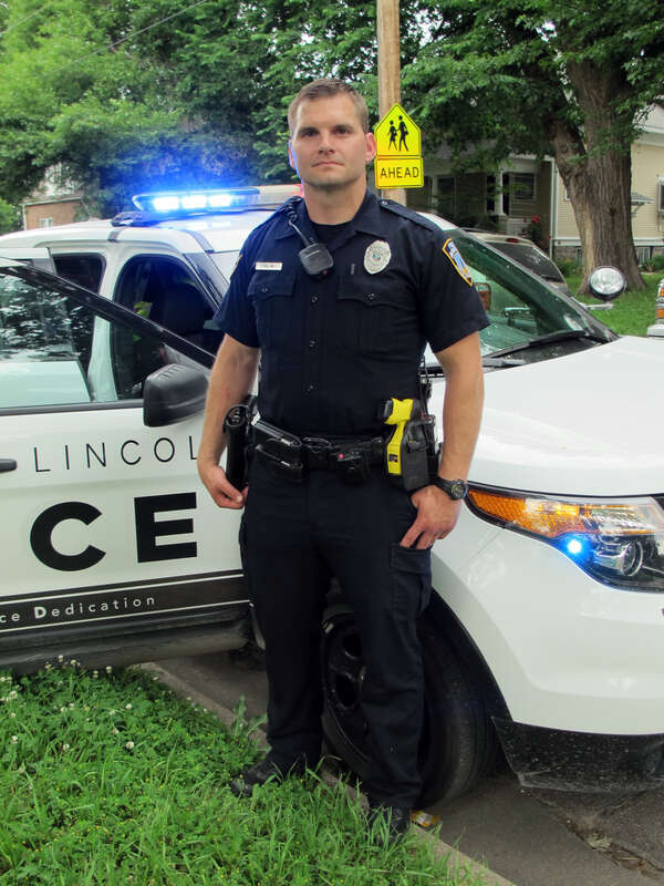 Photo of a Lincoln Police Officer in Lincoln, Nebraska.  Photo was taken next to Cooper Park, along S. 8th Street in Lincoln.