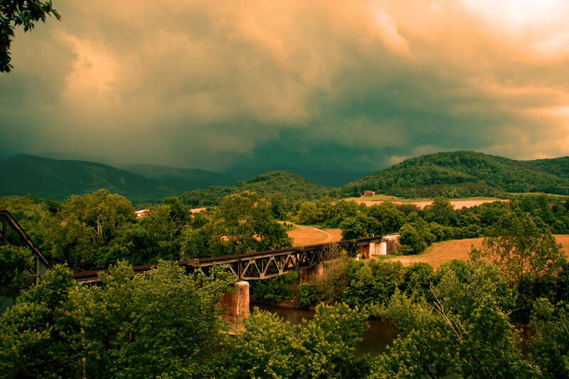 At the start of the long Memorial Day weekend, I thought I might get a shot of a NS train crossing the James River at Natural Bridge Station, VA.  There were plenty of clouds and a tremendous rainstorm, but no trains.  However, my luck changed two