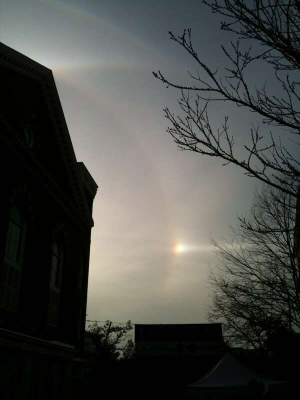Parry arc, upper tangent arc, 22° halo, and parhelion (sundog) in Salem, Massachusetts, Oct 27, 2012. The Daniel Low building is in the foreground.