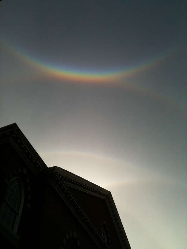 Circumzenithal arc, supralateral arc, Parry arc, and upper tangent arc, in Salem, Massachusetts, Oct 27, 2012. The Daniel Low building is in the foreground.