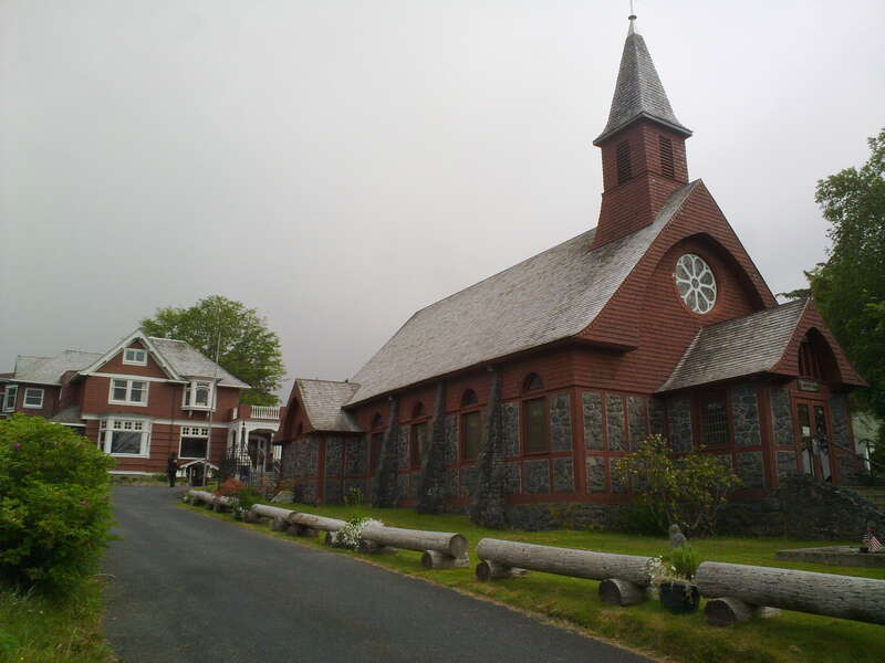 St. Peter's by the sea in Sitka, Alaska with the rectory, called the See House at the back left.  The two buildings are listed separately on the NRHP.
The See House is ref # 78000537

The church is ref # 78000538