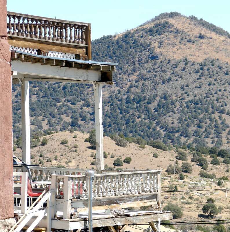 (1 in a 17-picture set)
These open air porches were on the back of a three-story commerical building.  Always a store would have rooms above which were used by the owner's family or rented out to boarders. These particular ones offered a long range