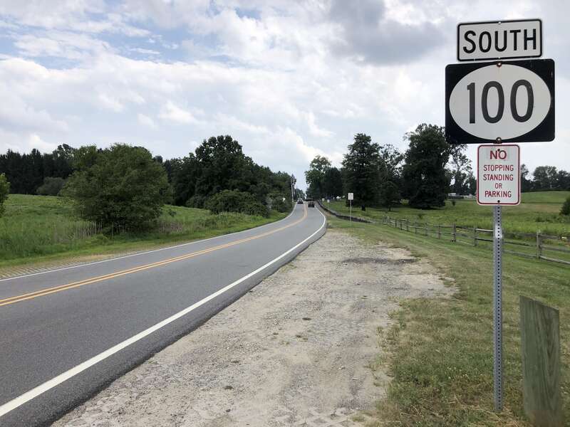 View south along Delaware State Route 100 (Montchanin Road) at Delaware State Route 92 (Thompson Bridge Road) and East Adams Dam Road in Winterthur, New Castle County, Delaware
