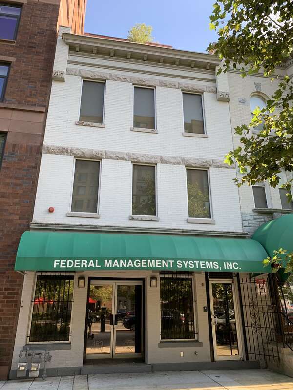 The building located at 460 K Street NW in the Mount Vernon Triangle neighborhood of Washington, D.C. was built for John J. Bowles as a store and to house dairy plant workers. The plant once one stood behind the building in Prather's Alley. Designed